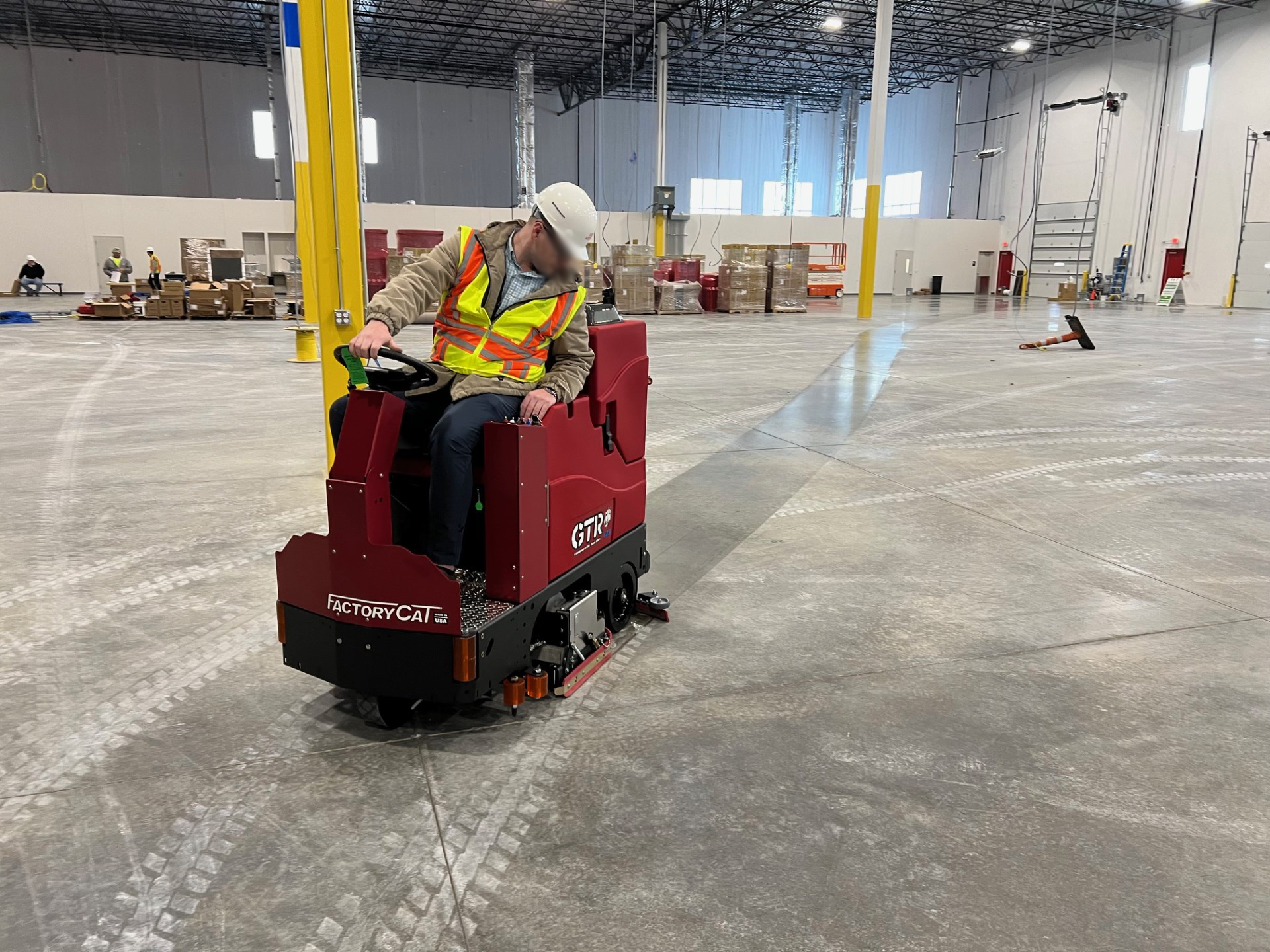 Factory‑Trained Technician Servicing Commercial Floor Scrubber – Franklin Cleaning Equipment & Supply